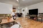 Open floor plan great for gathering,  Smart TV in living room